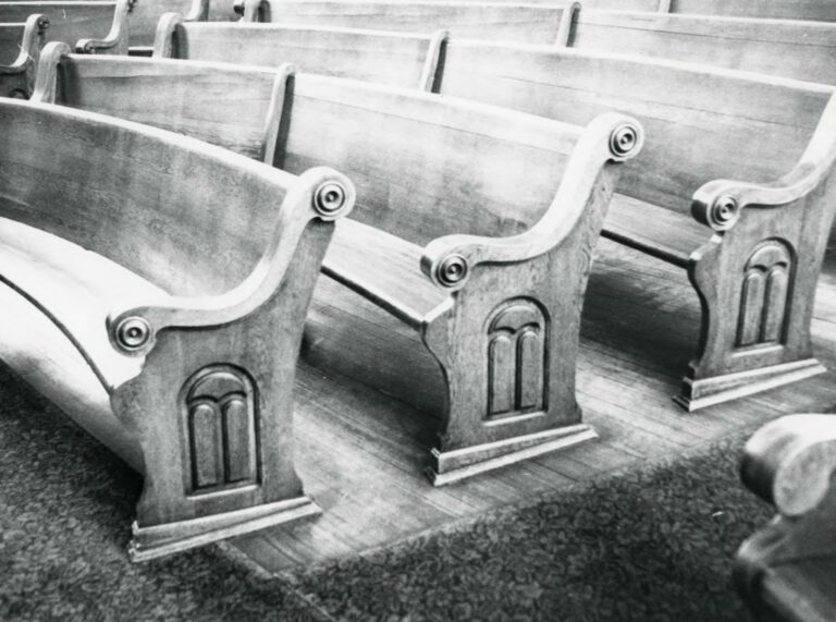 Oak, carved pews, as photographed for the National Registry in 1980
