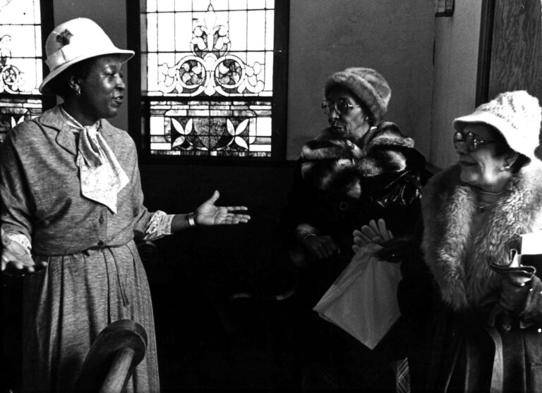 Francine Childs, Francis Raymond, and Mrs. Taylor in the sanctuary, ca.1980